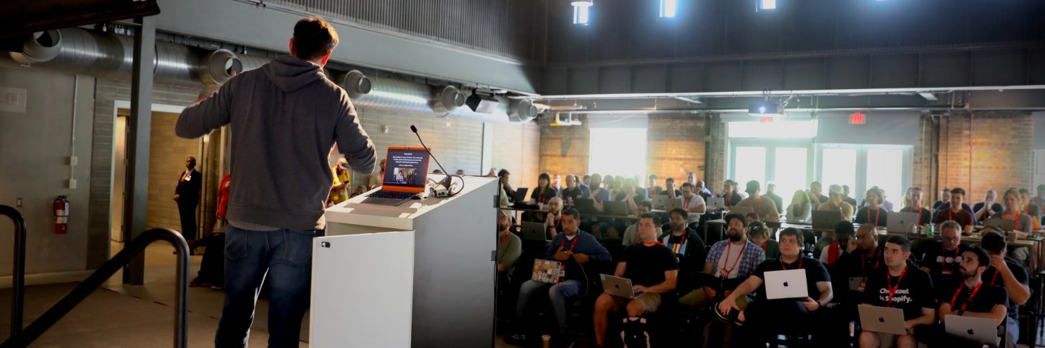 Chris Power speaking at a conference